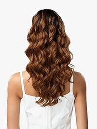 Load image into Gallery viewer, Woman wearing 19-inch Mimi drawstring ponytail with loose spiral curls; heat-safe synthetic ponytail for all hair types
